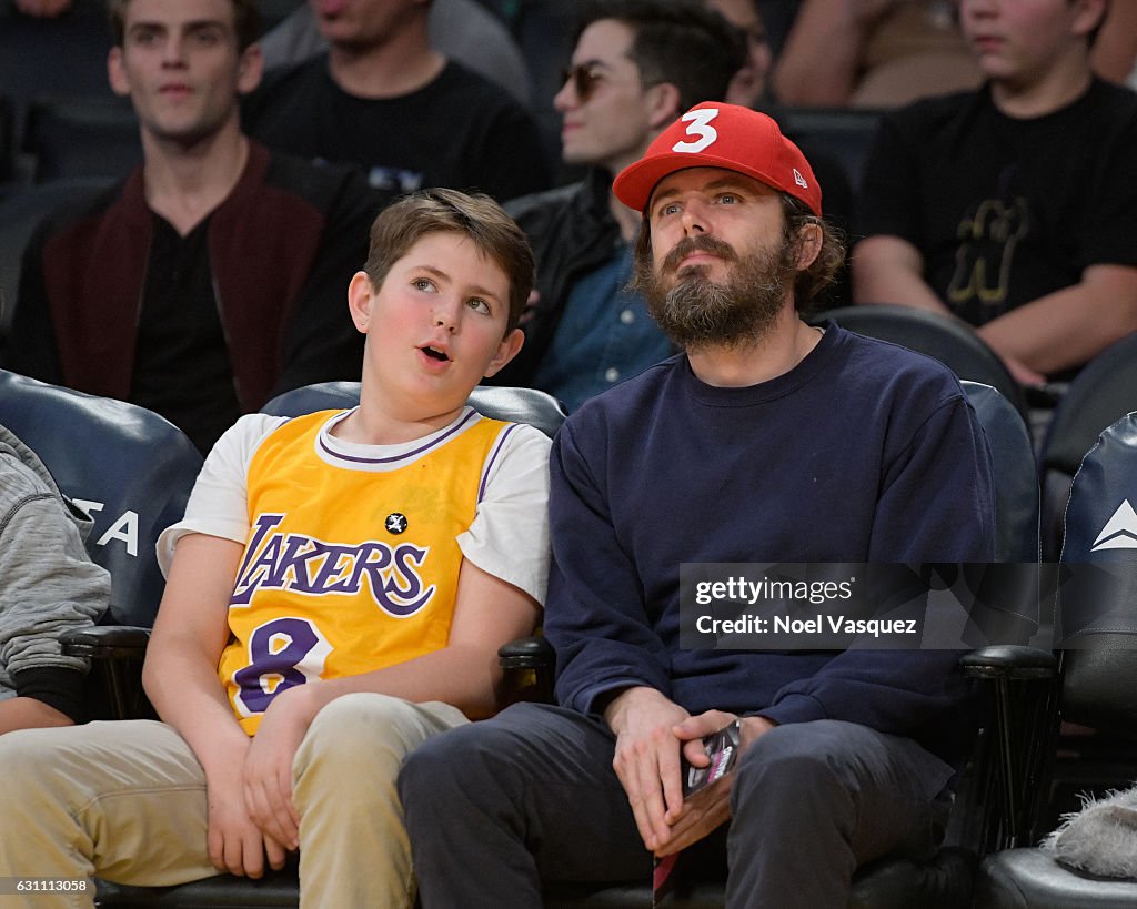 Casey Affleck And Son Indiana Affleck Attend A Basketball Game News casey-affleck-and-son-indiana-affleck-attend-a-basketball-game-news