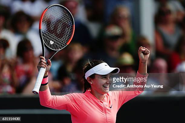 Lauren Davis of USA celebrates after winning her final match against Ana Konjuh of Croatia on day six of the ASB Classic on January 7, 2017 in...