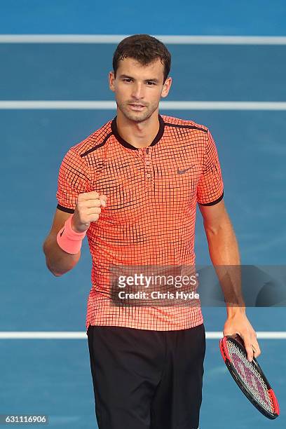 Grigor Dimitrov of Bulgaria celebrates winning against Milos Raonic of Canada during their semi final match during day seven of the 2017 Brisbane...