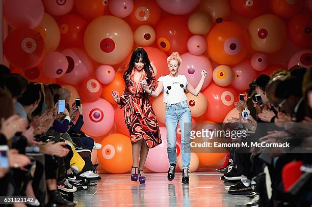 Daisy Lowe and Katie Eary are seen on the runway at the Katie Eary show during London Fashion Week Men's January 2017 collections at BFC Show Space...