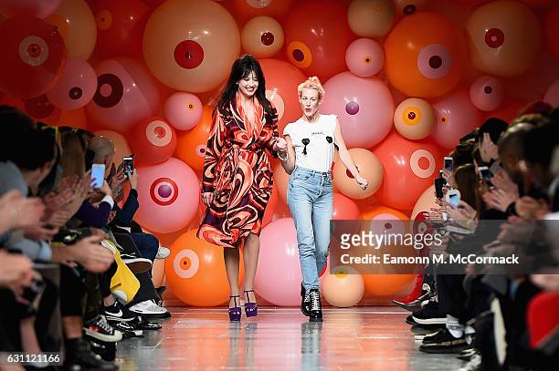 Daisy Lowe and Katie Eary are seen on the runway at the Katie Eary show during London Fashion Week Men's January 2017 collections at BFC Show Space...