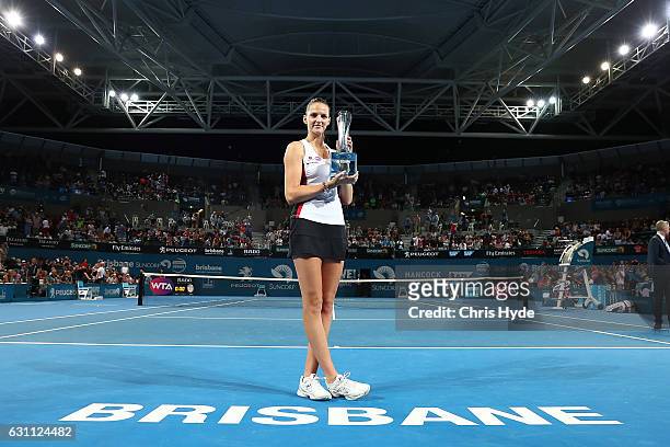 Karolina Pliskova of the Czech Republic holds the winners trophy after her match against Alize Cornet of France in the Women's Final on day seven of...