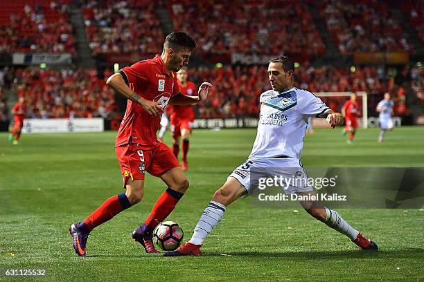 Sergio Guardiola of United competes for the ball with Alan Bar of the Victory during the round 14 A-League match between Adelaide United and...