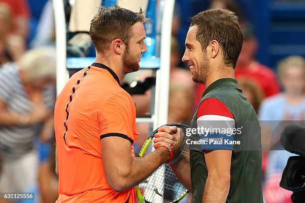 Richard Gasquet of France shakes hands with Jack Sock of the United States after winning the men's singles match during the 2017 Hopman Cup Final at...