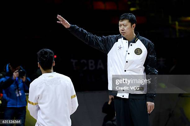 Wang Zhizhi, coach of Southern Team, provides guidance for Southern Team's training ahead of Rookie Game as part of 2017 CBA All-Star Weekend on...