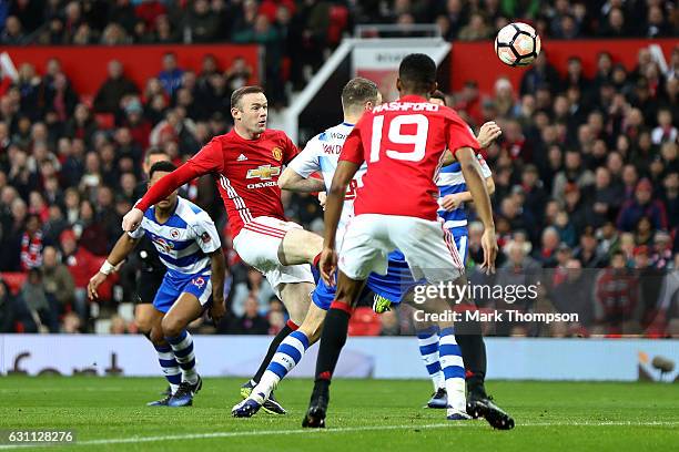 Wayne Rooney of Manchester United scores his sides first goal during the Emirates FA Cup third round match between Manchester United and Reading at...