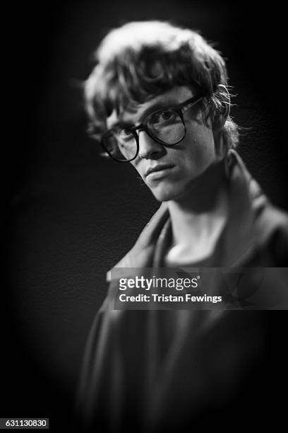 Model backstage ahead of the E.Tautz show during London Fashion Week Men's January 2017 collections at BFC Backstage Space on January 7, 2017 in...
