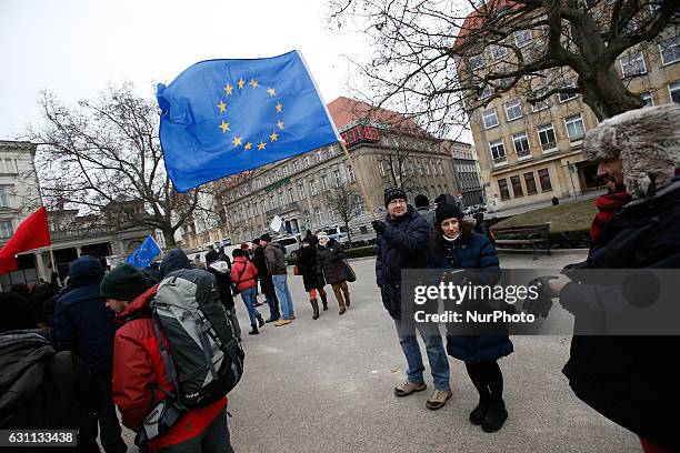 People are seen at a rally against racial violence in Poznan on 7 January, 2017. Recent incidents involving violence against ethnic minorities and...