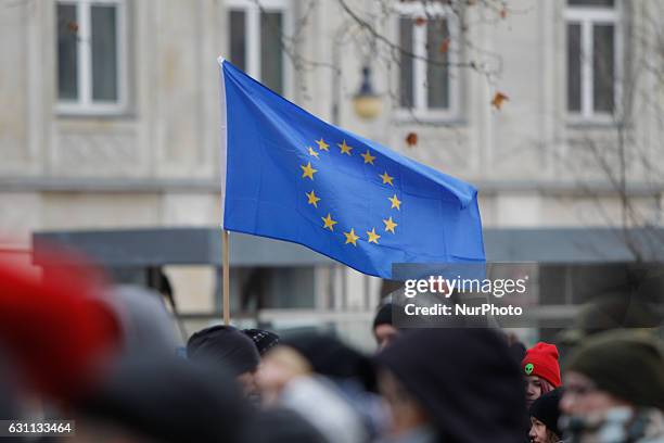 People are seen at a rally against racial violence in Poznan on 7 January, 2017. Recent incidents involving violence against ethnic minorities and...