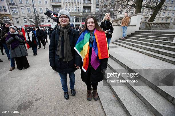 People are seen at a rally against racial violence in Poznan on 7 January, 2017. Recent incidents involving violence against ethnic minorities and...