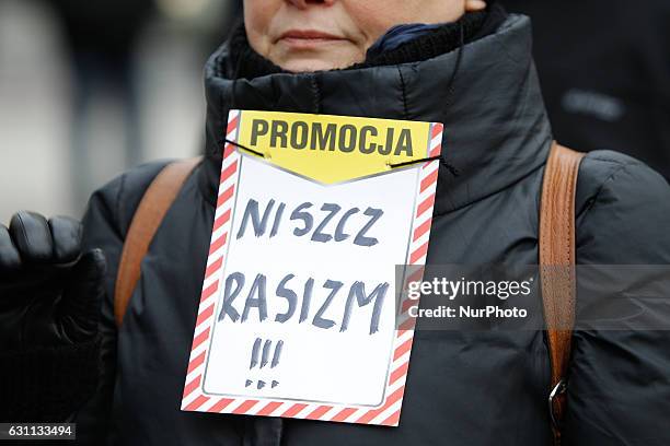 People are seen at a rally against racial violence in Poznan on 7 January, 2017. Recent incidents involving violence against ethnic minorities and...