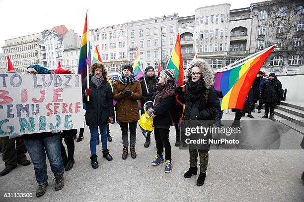 People are seen at a rally against racial violence in Poznan on 7 January, 2017. Recent incidents involving violence against ethnic minorities and...