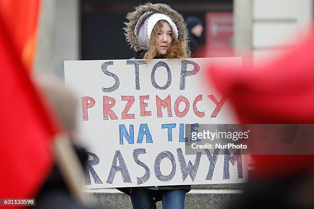 People are seen at a rally against racial violence in Poznan on 7 January, 2017. Recent incidents involving violence against ethnic minorities and...