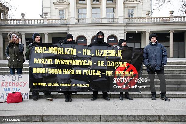 People are seen at a rally against racial violence in Poznan on 7 January, 2017. Recent incidents involving violence against ethnic minorities and...