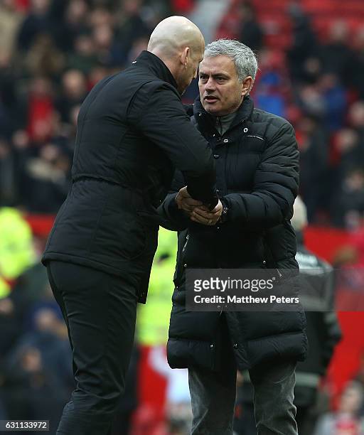 Manager Jose Mourinho of Manchester United and Manager Jaap Stam of Reading shake hands after the Emirates FA Cup Third Round match between...
