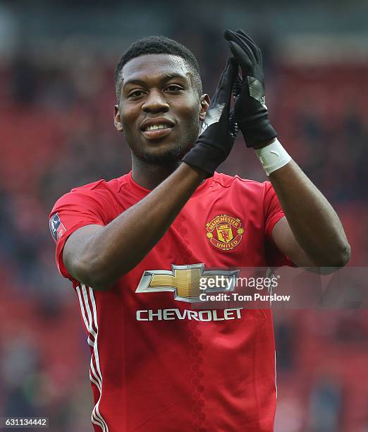 Timothy Fosu-Mensah of Manchester United applauds the fans after the Emirates FA Cup Third Round match between Manchester United and Reading at Old...