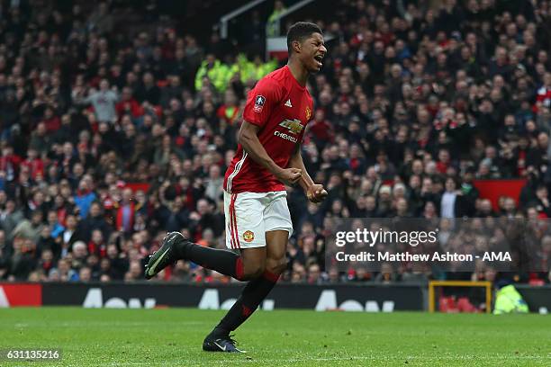 Marcus Rashford of Manchester United celebrates scoring his team's third goal to make the score 3-0 during the Emirates FA Cup third round match...