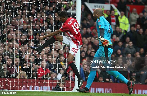 Marcus Rashford of Manchester United scores their fourth goal during the Emirates FA Cup Third Round match between Manchester United and Reading at...