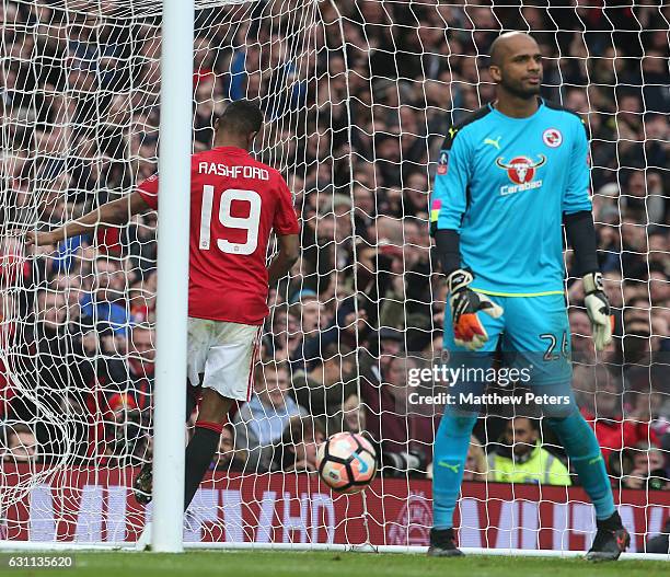 Marcus Rashford of Manchester United scores their fourth goal during the Emirates FA Cup Third Round match between Manchester United and Reading at...