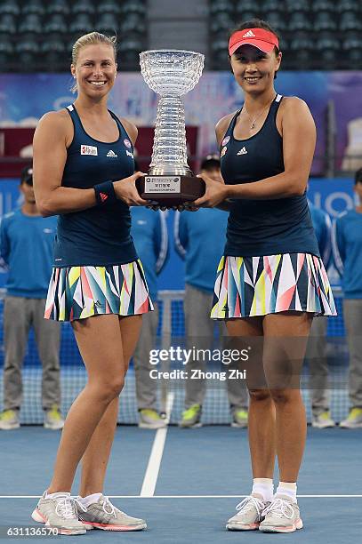 Andrea Hlavackova of the Czech Republic and Peng Shuai of China pose for photo after winning the doubles final match against Raluca Olaru of Romania...