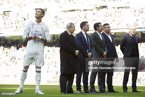 Cristiano Ronaldo of Real Madrid CF waits for his golden ball ahead Raymond Kopa , Michael Owen , Luis Figo , Ronaldo Nazario and head coach Zinedine...