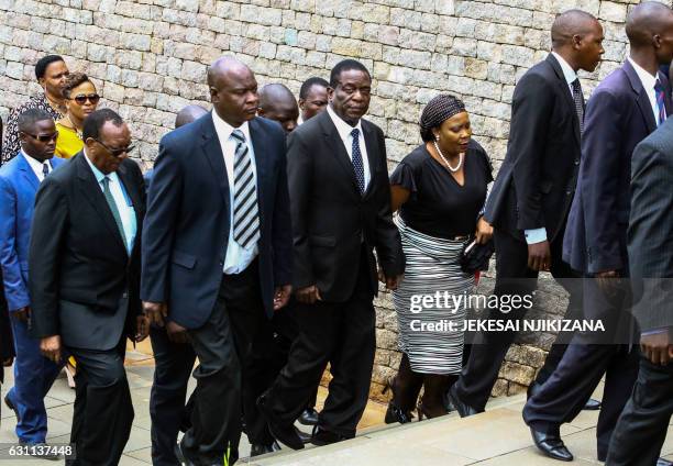 Zimbabwe acting President Emmerson Mnangagwa arrives at the funeral ceremony of Peter Chanetsa at the National Heroes Acre in Harare, on January 7,...