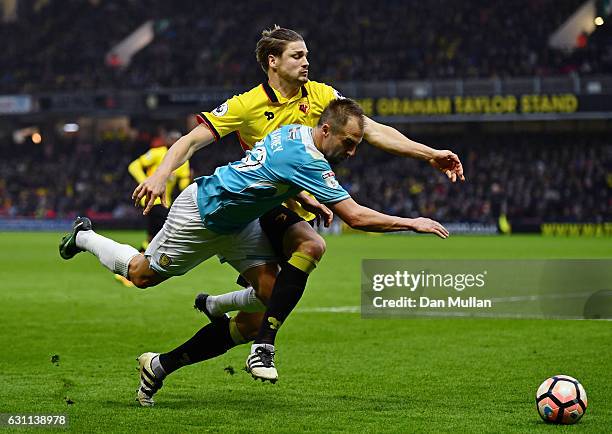 Luke Varney of Burton Albion and Sebastian Prodl of Watford in action during The Emirates FA Cup Third Round match between Watford and Burton Albion...