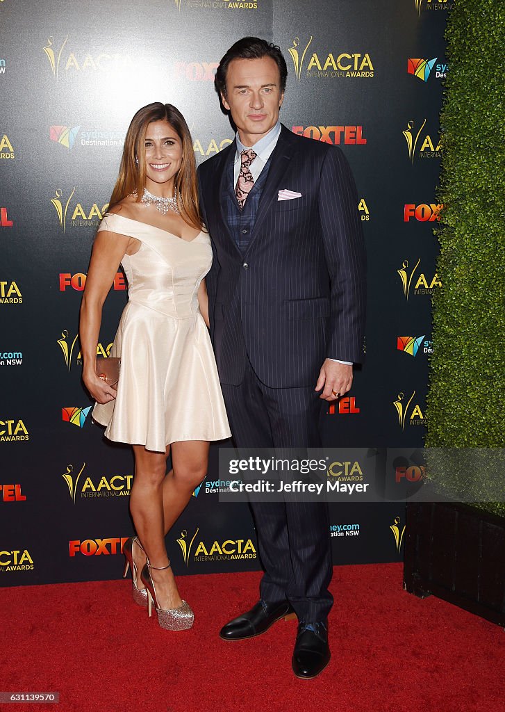 Kelly Paniagua and actor Julian McMahon arrive at the 6th AACTA... News