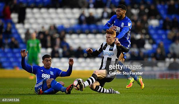 Newcastle player Jack Colback challenges Che Adams of Birmingham during The Emirates FA Cup Third Round match between Birmingham City and Newcastle...