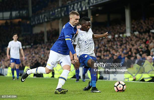 Ahmed Musa of Leicester City in action with Gerard Deulofeu of Everton during the FA Cup third round tie between Everton and Leicester City at...