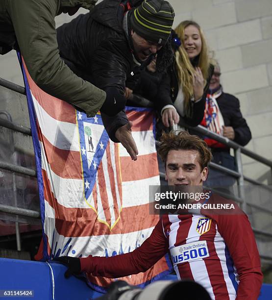 Atletico Madrid's French forward Antoine Griezmann celebrates after scoring his team's second goal during the Spanish league football match SD Eibar...