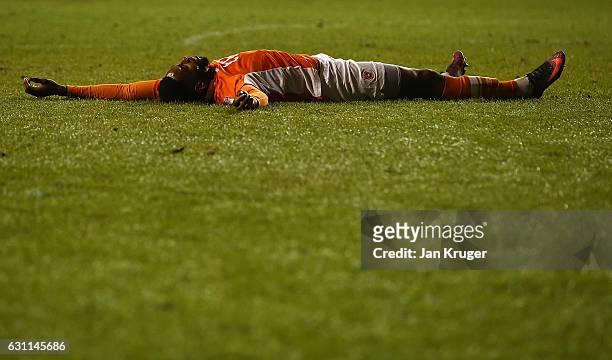 Jamille Matt of Blackpool lies on his back dejected after seeing his shot at goal go wide during The Emirates FA Cup Third Round match between...