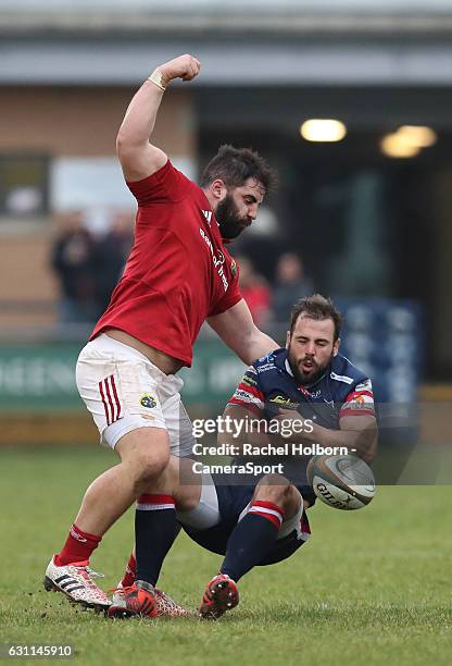 Munster As Kevin O'Byrne and Doncaster Knights' WillGriff John drops the ball during the British & Irish Cup Pool 2 match between Doncaster and...