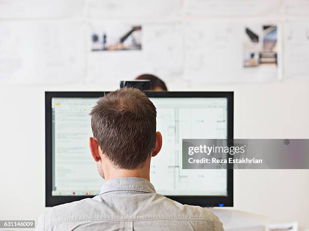 Computer Behind View 12.374 Man On Computer From Behind Stock Photos, High-Res Pictures, and ...