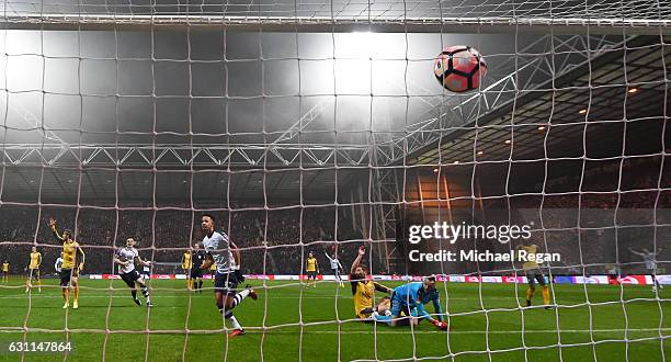 Callum Robinson of Preston North End celebrates scoring the opening goal during the Emirates FA Cup Third Round match between Preston North End and...