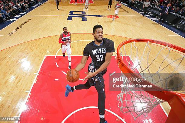 Karl-Anthony Towns of the Minnesota Timberwolves throws down a windmill dunk during the game against the Washington Wizards on January 6, 2017 at...