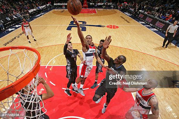 Bradley Beal of the Washington Wizards drives to the basket and shoots the ball against the Minnesota Timberwolves on January 6, 2017 at Verizon...