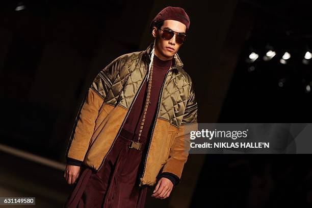 Model presents a creation by fashion designer Astrid Andersen on the second day of the Autumn/Winter 2017 London Fashion Week Men's fashion event in...