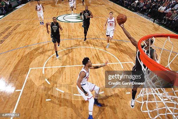 Milwaukee, WI Jason Terry throws an alley-oop to Jabari Parker of the Milwaukee Bucks during the game against the New York Knicks on January 6, 2017...