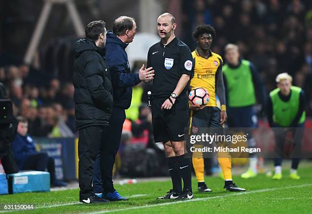 Simon Grayson manager of Preston North End in discussion with referee Robert Madley during the Emirates FA Cup Third Round match between Preston...