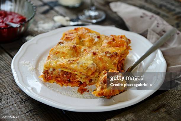 plate of lasagne - lasagne stock pictures, royalty-free photos & images