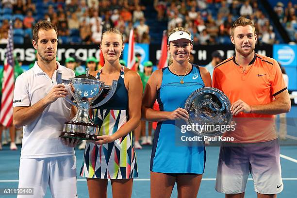 Winners Richard Gasquet and Kristina Mladenovic of France pose with runner's up Coco Vandeweghe and Jack Sock of the United States pose during the...