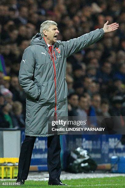 Arsenal's French manager Arsene Wenger gestures on the touchline during the English FA Cup third round football match between Preston North End and...