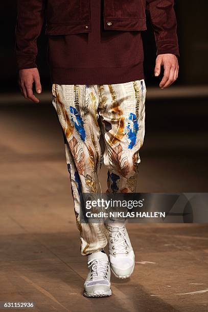 Model presents a creation by fashion designer Astrid Andersen on the second day of the Autumn/Winter 2017 London Fashion Week Men's fashion event in...