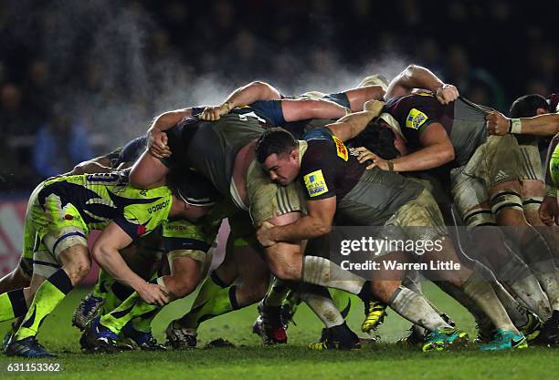 The teams battle in the scrum during the Aviva Premiership match between Harlequins and Sale Sharks at Twickenham Stoop on January 7, 2017 in London,...