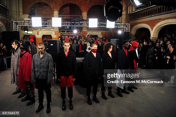Models walk the runway at the Agi & Sam x The Woolmark Company show during London Fashion Week Men's January 2017 collections at The Welsh Chapel on...