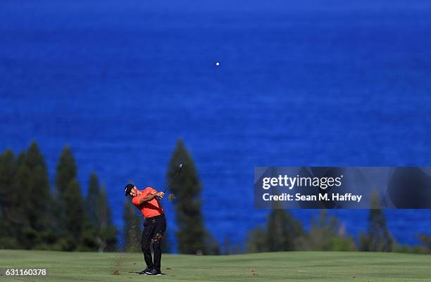 Jason Day of Australia plays a shot on the fourth hole during the third round of the SBS Tournament of Champions at the Plantation Course at Kapalua...