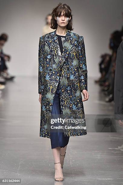 Model walks the runway at the Casely-Hayford Autumn Winter 2017 fashion show during London Menswear Fashion Week on January 7, 2017 in London, United...