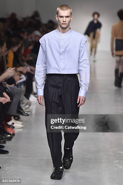 Model walks the runway at the Casely-Hayford Autumn Winter 2017 fashion show during London Menswear Fashion Week on January 7, 2017 in London, United...