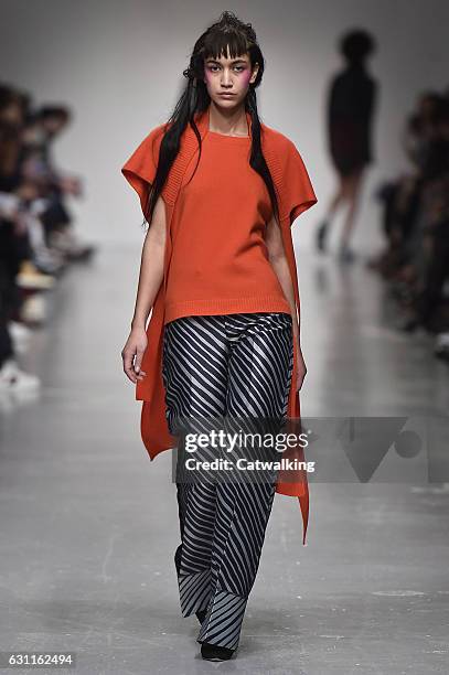 Model walks the runway at the Casely-Hayford Autumn Winter 2017 fashion show during London Menswear Fashion Week on January 7, 2017 in London, United...